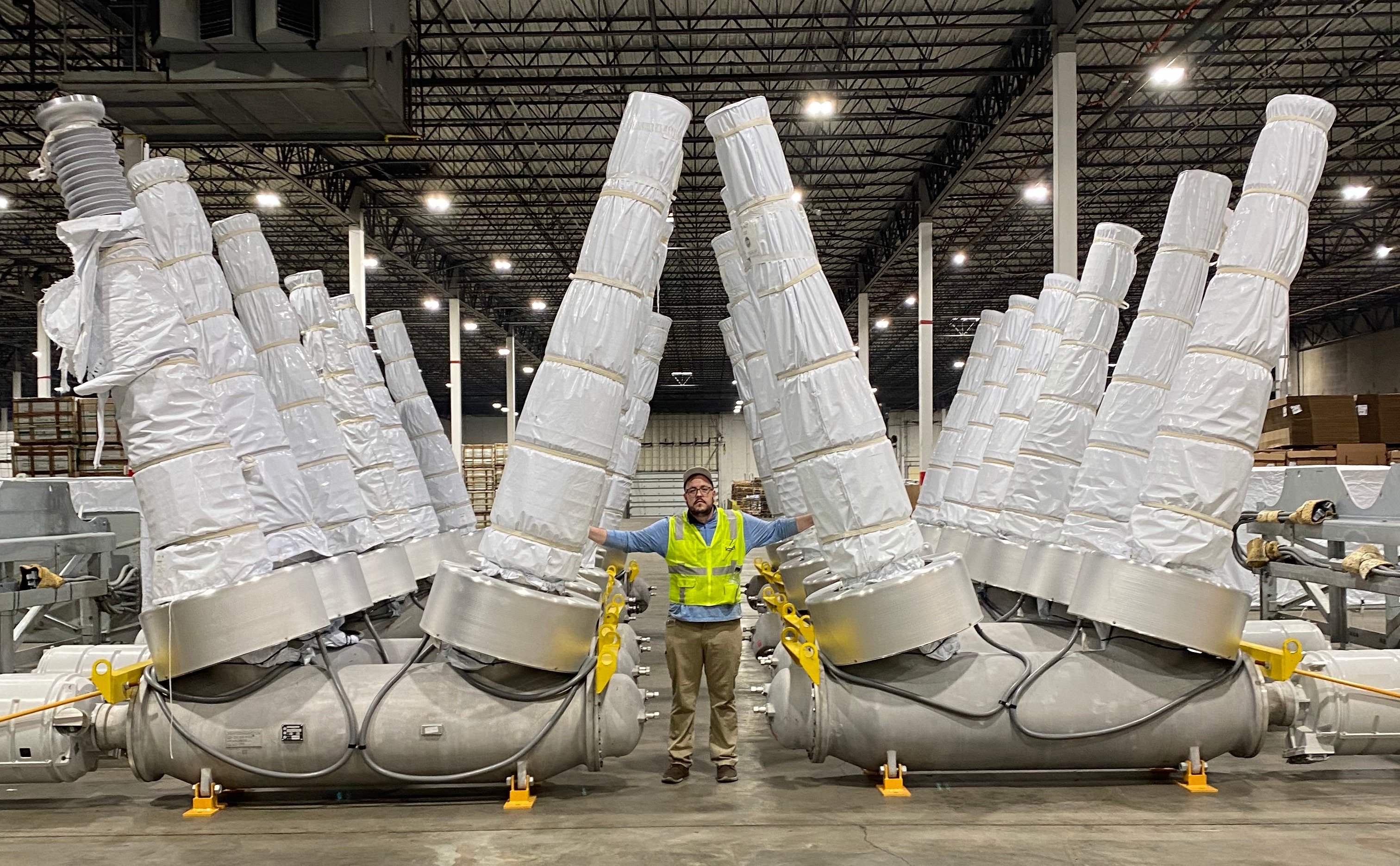 Multiple breakers staged in large warehouse